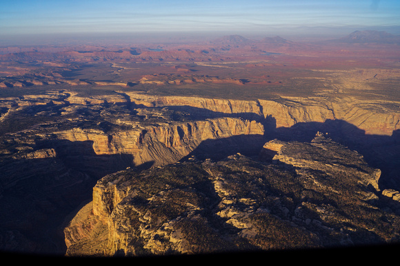 Cataract Canyon with Lake Powell and the Henry Mnts in distance