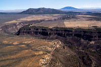 Rio Grande River with mountains in distance, left to right; Cerro Chiflo, Ute Mountain and Sangre de Cristo range in Colorado