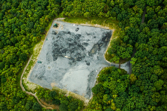 Marcellus shale industry pad with visible tanks, Tiadaghton State Forest