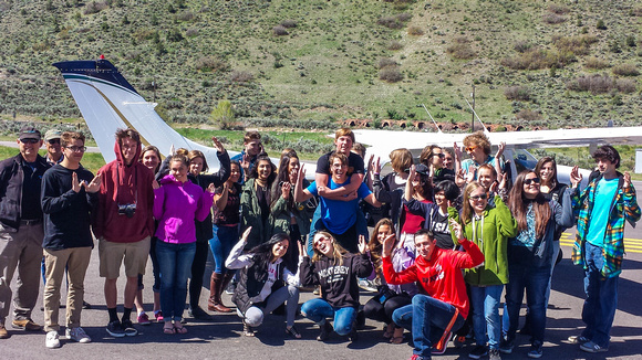 Students in front of EcoFlight plane at Glenwood Springs airport